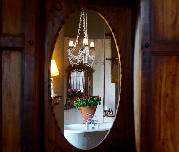 North Lodge bathroom seen thru a cut hole 